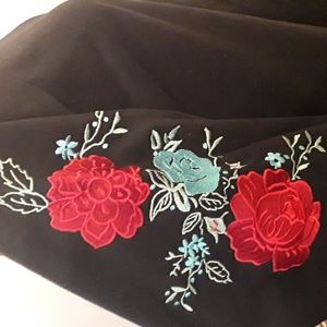 Black long sleeved sweatshirt with embroidered flowers on the sleeves 4X